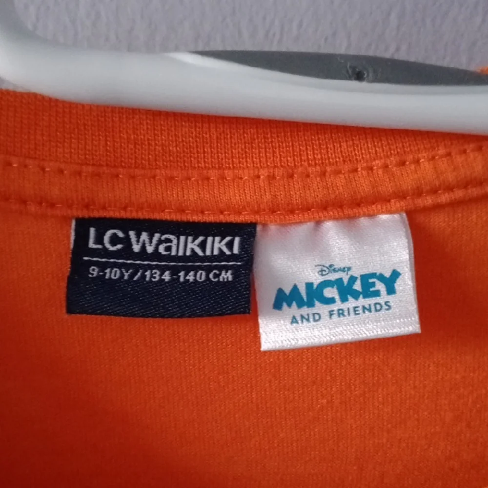 Bright Orange Long Sleeve Tee with Festive Design - Picture 2 of 6